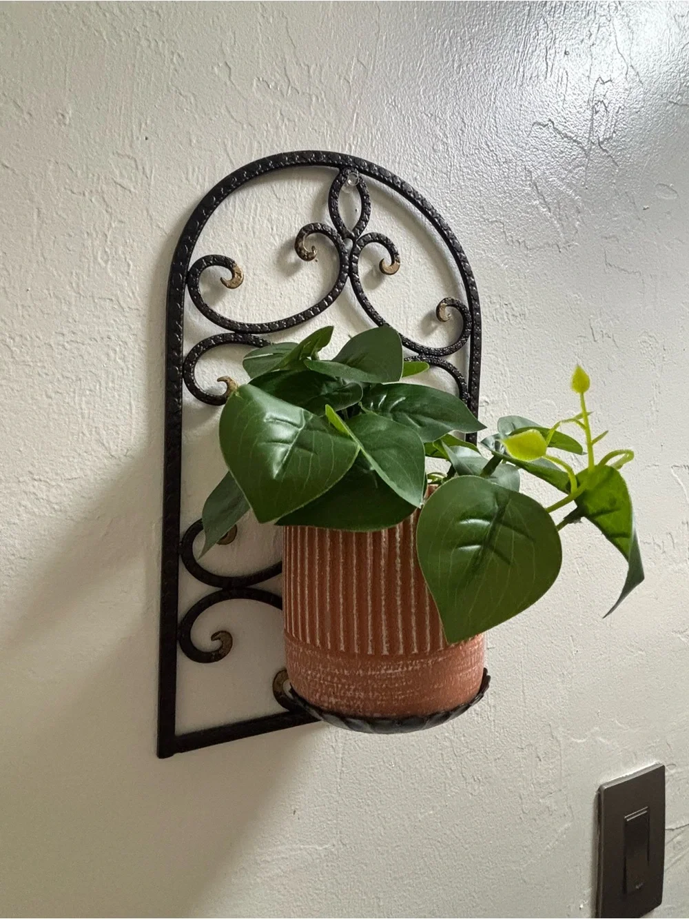Two vintage iron scroll wall sconce candle holders